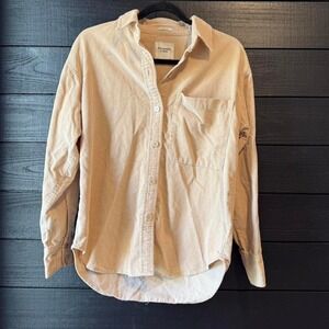 Oversized corduroy button-down with full front placket.